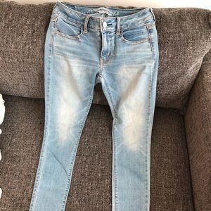 American Eagle light blue jeans.